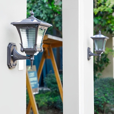 Solar-Powered Outdoor Wall Light with Waterproof Design, Automatic Day/Night Sensor, and Striped Glass Shade for Enhanced Home Ambience