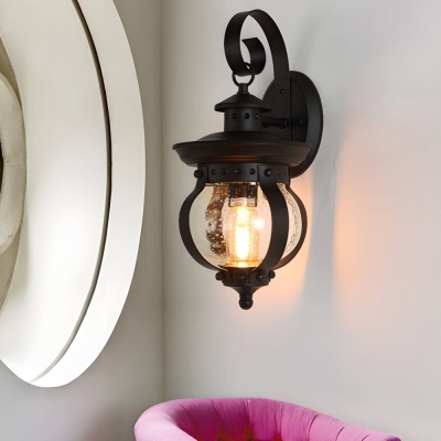Elegant Matte Black Outdoor Wall Light with Seeded Glass Shade and Curved Arm, High-Quality Iron and Art Glass Lantern for Timeless Charm