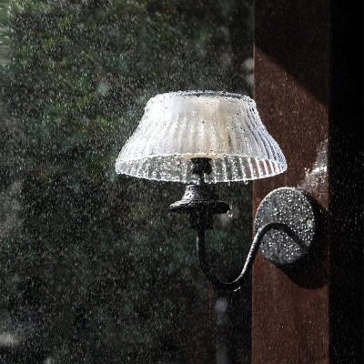Durable IP44 Waterproof Outdoor Wall Light with Curved Black Metal Arm and Adjustable Solar-Powered Glass Shade for Easy Installation